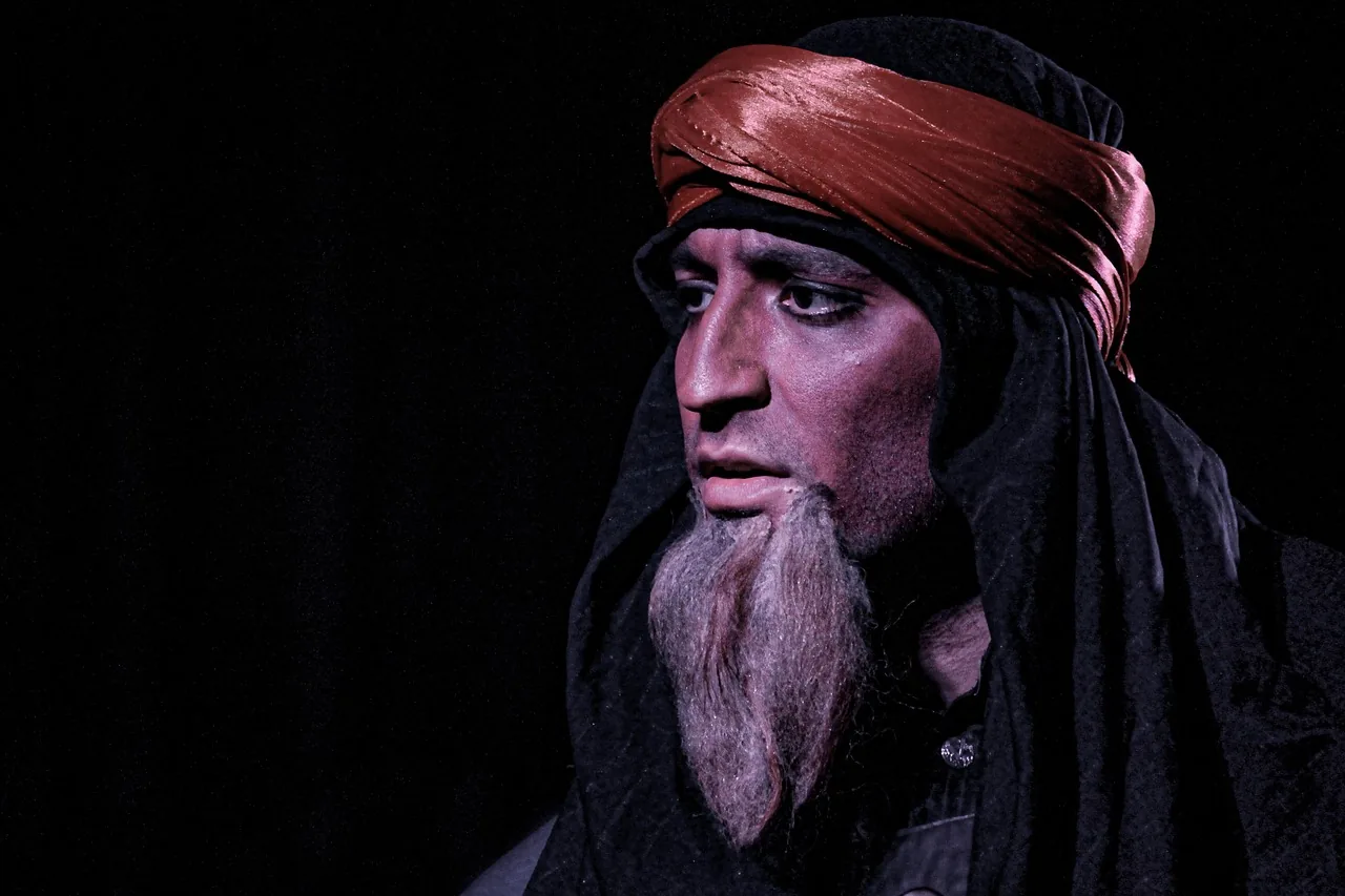 Costumed actor on a theater stage