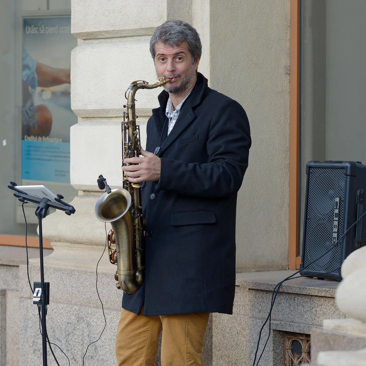 Saxophonist in an urban musical performance